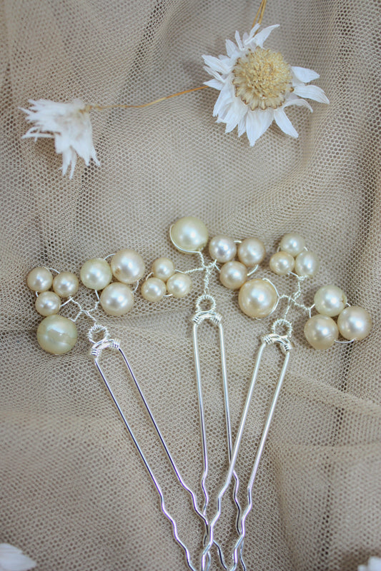 one of a kind pearl and silver hair pins 